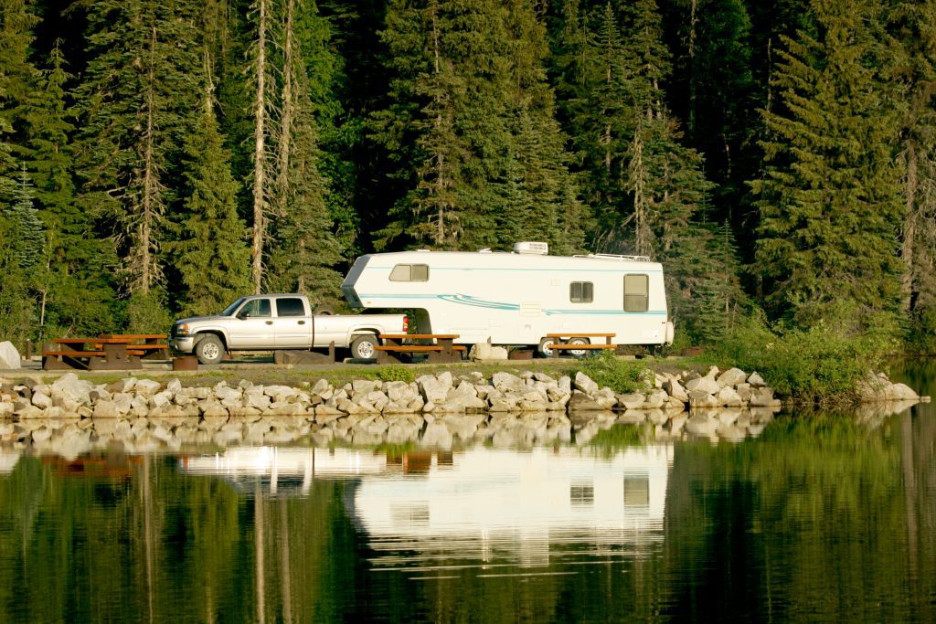 fifth wheel camper by water